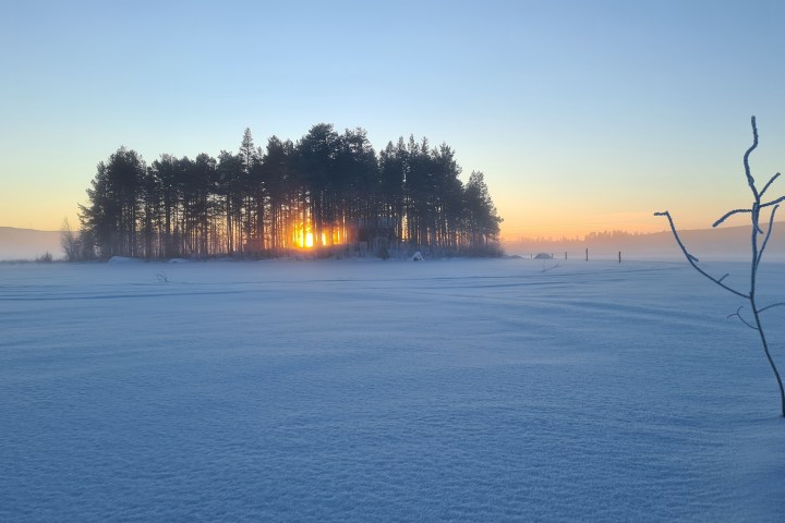 a sunset over a body of water